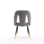 Silla de comedor moderna contemporánea de terciopelo - Tachuelas, patas de metal negro con puntas doradas