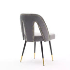 Silla de comedor moderna contemporánea de terciopelo - Tachuelas, patas de metal negro con puntas doradas