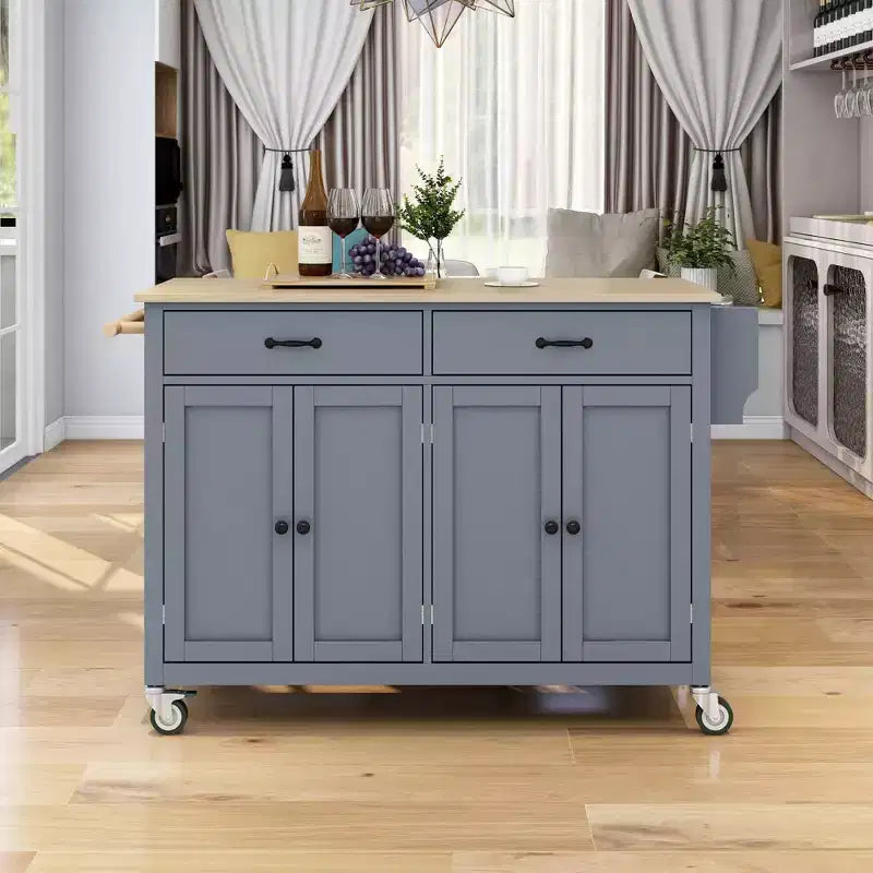 Isla de cocina con encimera de madera y ruedas con freno