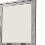 Espejo de pared con marco rectangular y detalles moldeados, gris
